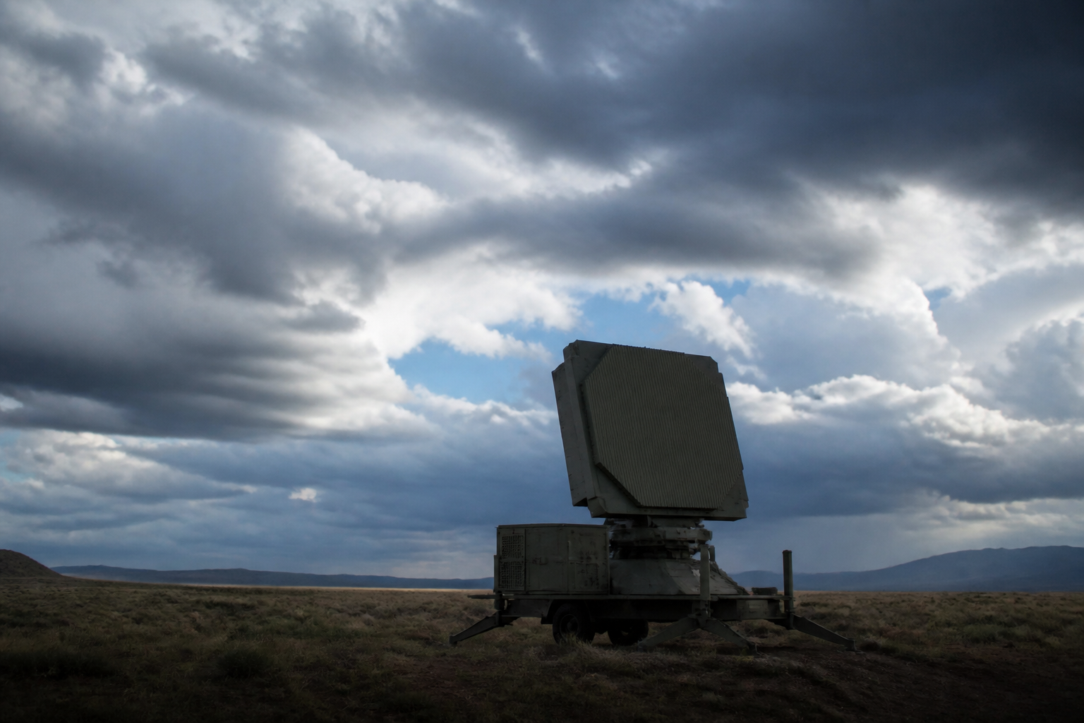 Mobile ground-based AESA radar array in an open field