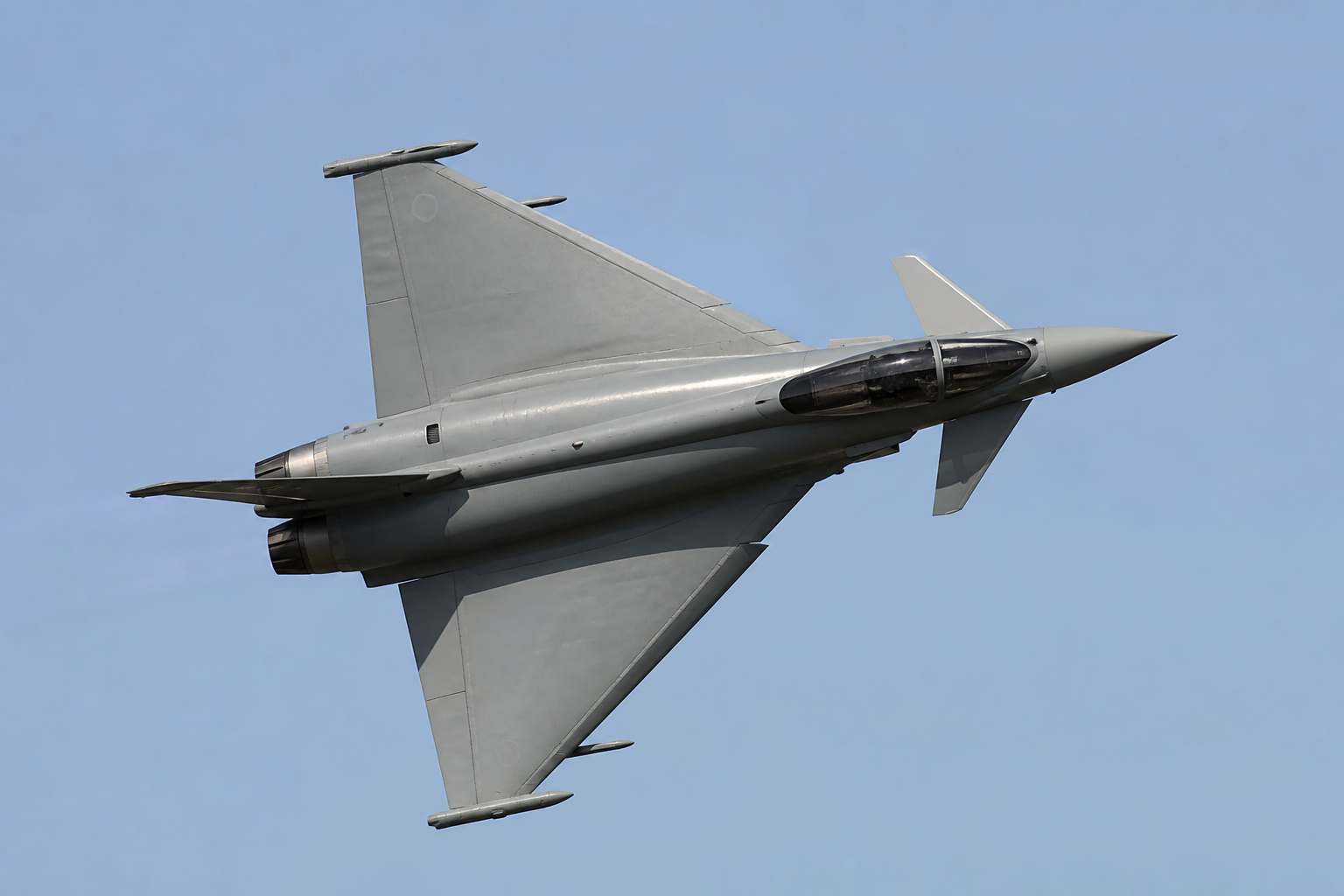 Eurofighter Typhoon climbing with afterburners visible
