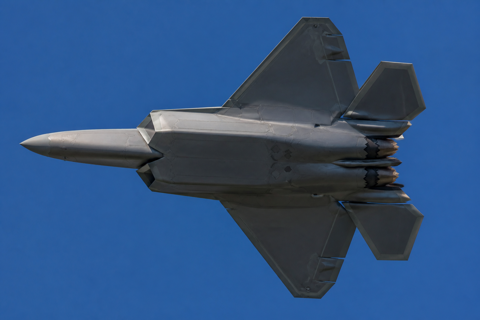 F-35 fighter jet viewed from below in flight