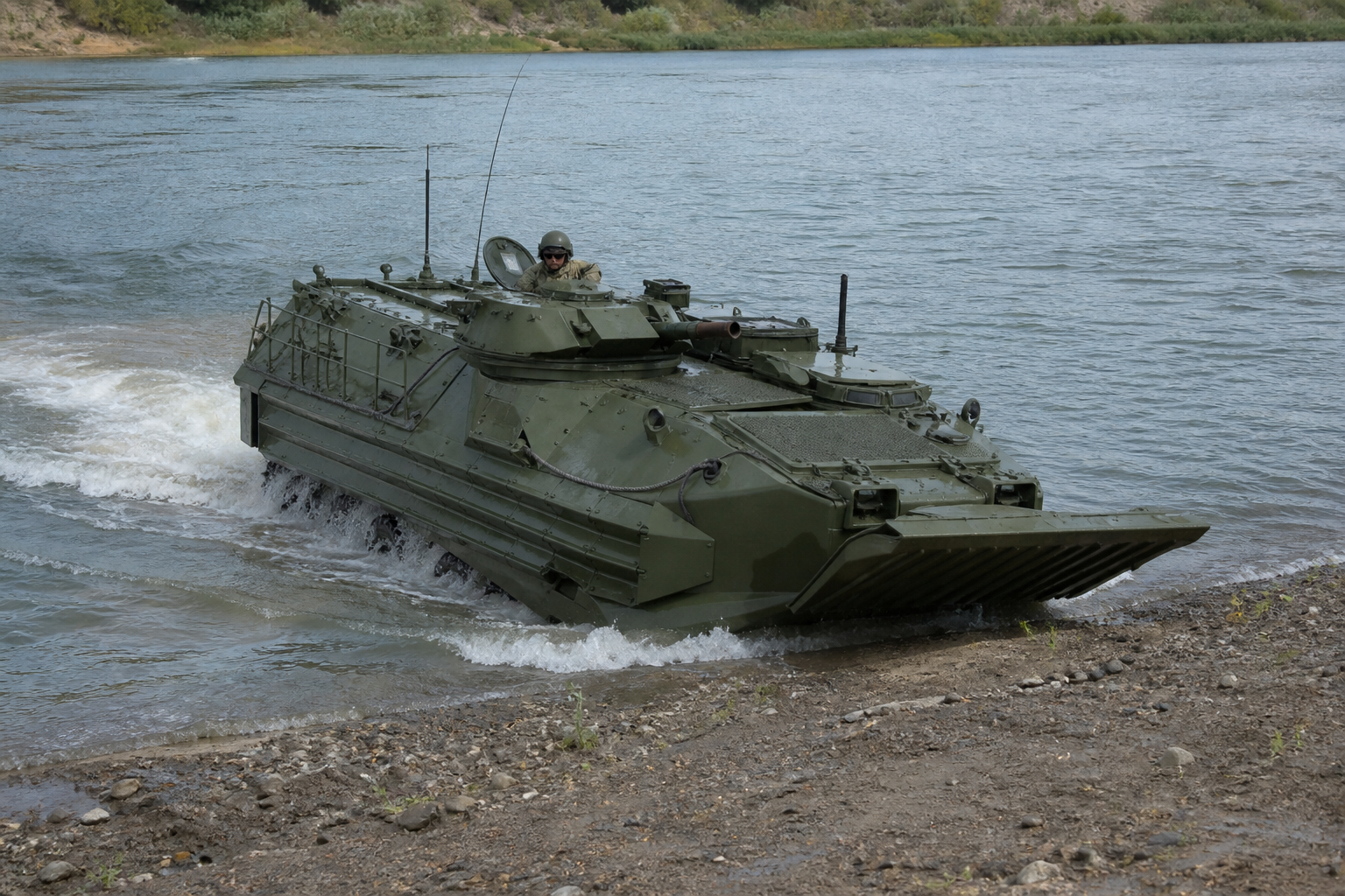 Amphibious armored personnel carrier entering a river